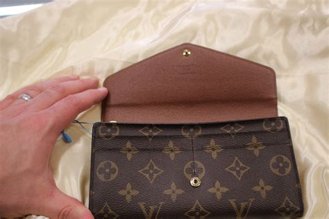 lv sarah wallet monogram price